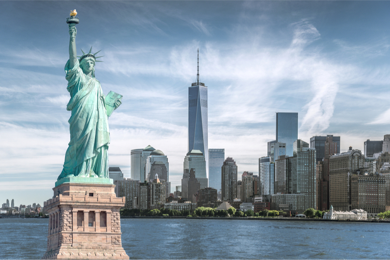 The statue of Liberty with World Trade Center background, Landmarks of New York City