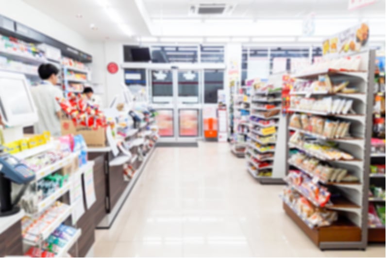 Blurred interior of convenience store