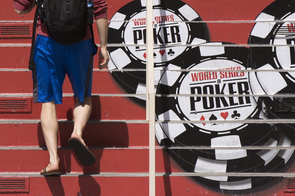 man walking up steps of WSOP 2019 venue entrance