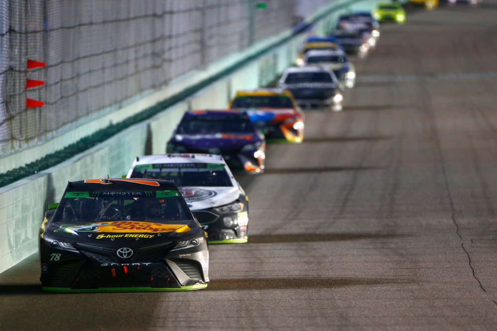 race cars in line on a track