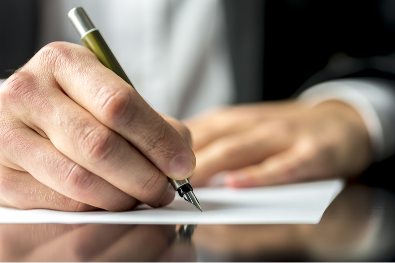 Man writing letter